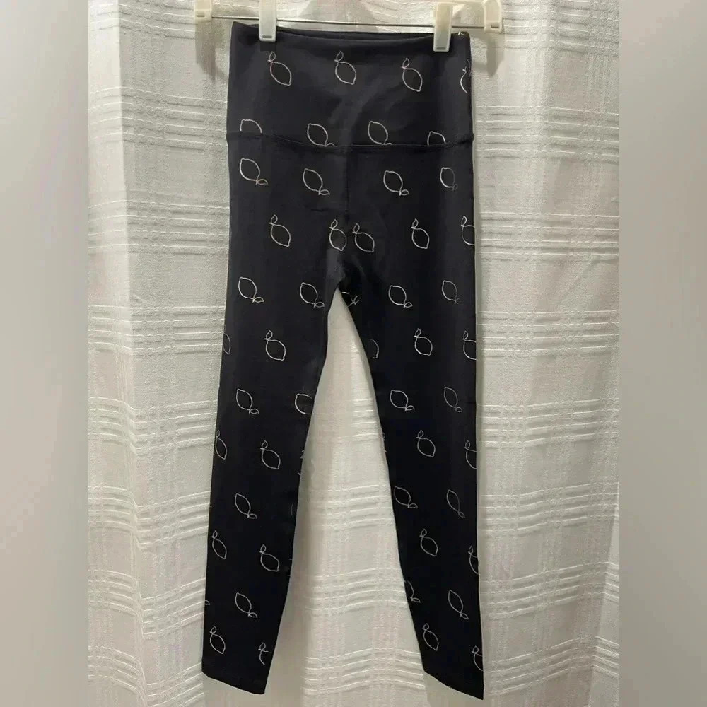 Beyond Yoga gold lemon and black leggings gym leggings women’s XS